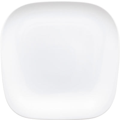 Ein leeres, quadratisches, weißes Porzellanteller mit abgerundeten Ecken. Der Teller hat eine glatte Oberfläche und reflektiert das Licht leicht, wodurch ein minimalistisches und modernes Design hervorgehoben wird. Der Hintergrund ist einfarbig und lenkt den Fokus auf den Teller.