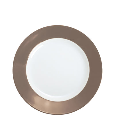 Ein runder Teller mit einem schmalen, braunen Rand und einer weißen, glatten Oberfläche in der Mitte. Der Teller hat ein einfaches, modernes Design und eignet sich für den Einsatz bei verschiedenen Anlässen, wie zum Beispiel beim Essen oder Servieren von Snacks. Die Kombination aus dem neutralen Farbton und der klassischen Form verleiht ihm eine elegante Note.