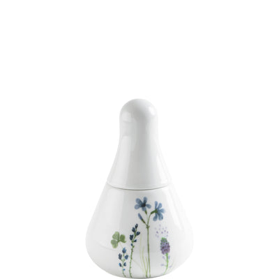 Ein elegantes, weißes Porzellanbehältnis in Tropfenform mit einem abgerundeten Deckel. Das Behältnis ist mit zarten, bunten Blumenmotiven verziert, darunter blaue Blumen, lila Lavendel und grüne Blätter. Es steht auf einer hellen Oberfläche und wirkt freundlich und dekorativ, ideal für den Einsatz in einem Badezimmer oder auf einem Tisch.