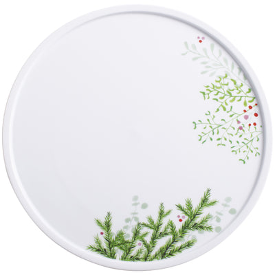 Runder weißer Teller mit einem dekorativen Muster aus grünen, nadeligen Zweigen und kleinen, bunten Beeren. Das Design ist an den Rändern des Tellers angeordnet und verleiht dem Geschirr eine frische, natürliche Note. Ideal für festliche Anlässe oder als dekoratives Element im Essbereich.