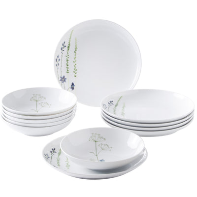 Set mit Keramiktellern, bestehend aus sechs flachen Tellern und fünf tiefen Schalen. Die Teller und Schalen sind weiß mit zarten, bunten Blumendekoren in Blau und Grün, die auf den Rändern der Geschirrteile angebracht sind. Die flachen Teller sind stapelbar und die Schalen bieten eine sanfte, runde Form. Ideal für eine ansprechende Tischpräsentation.