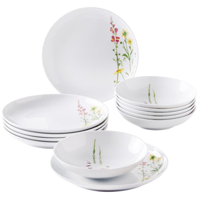Set aus Geschirr mit floralen Motiven, bestehend aus mehreren flachen Tellern und Schalen. Die Teller sind weiß und zeigen zarte Blumen aus verschiedenen Farben, die ihnen ein elegantes Aussehen verleihen. Die Schalen sind ebenfalls weiß und umfassen das gleiche florale Design. Das Geschirr ist harmonisch gestapelt und vermittelt einen frischen, einladenden Eindruck, ideal für festliche Tischdekorationen oder den Alltag.