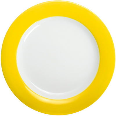Ein runder Teller mit einer weißen, glatten Innenfläche und einem leuchtend gelben Rand. Der Teller ist schlicht gehalten, optimal für den Einsatz im Alltag und bei festlichen Anlässen. Der starke Kontrast zwischen der gelben und der weißen Farbe verleiht ihm eine frische, moderne Ausstrahlung. Ideal zum Servieren von Speisen oder als stilvolle Dekoration.