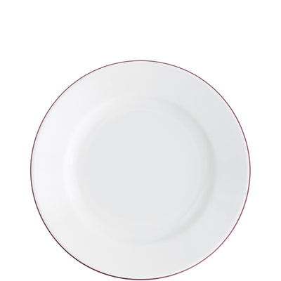 Ein weißer, runder Teller aus Porzellan, ohne Dekoration, mit einem schmalen, roten Rand. Die Oberfläche ist glatt und glänzend, der Teller hat eine gleichmäßige Form und ist zentral auf einem hellen Hintergrund platziert. Ideal für das Servieren von Speisen oder als dekoratives Element.