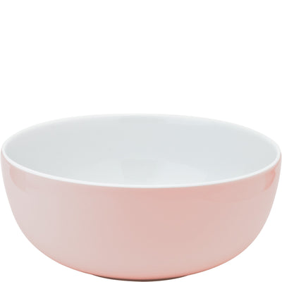 Eine runde Schüssel mit einem sanften rosa Äußeren und einem weißen Innenbereich. Die Schüssel hat glatte, glänzende Oberflächen und einen einfachen, modernen Stil. Sie eignet sich perfekt für Servieren oder Aufbewahren von Lebensmitteln. Die Maße und das leichte Design machen sie vielseitig in der Verwendung.