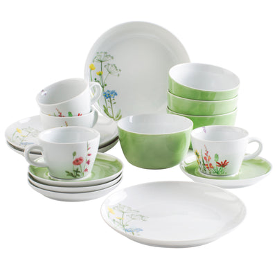 Eine ansprechende Geschirrkollektion besteht aus weißen Tellern und Tassen mit bunten Blumenmotiven sowie grünen Schalen. Die Tassen sind mit verschiedenen floralen Designs verziert, während die Schalen in einem sanften Grünton erhältlich sind. Alle Teile sind ordentlich gestapelt und vermitteln ein harmonisches und einladendes Ambiente.