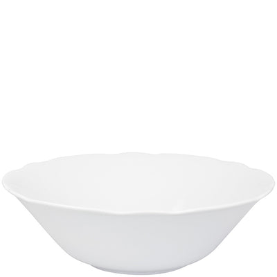 Eine weiße, flache Schale mit einem leicht gewellten Rand. Die Schale steht auf einem neutralen Hintergrund und hat eine glänzende Oberfläche, die Licht reflektiert. Sie eignet sich für die Präsentation verschiedener Speisen oder als dekoratives Element.