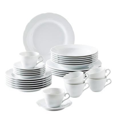 Ein Set aus weißem Geschirr, das mehrere Teller, Schalen und Tassen umfasst. Im Vordergrund stehen mehrere gesteckte Tassen mit Untertassen, während im Hintergrund stapelbare flache und tiefere Teller angeordnet sind. Das Geschirr hat ein schlichtes, elegantes Design ohne Muster und eignet sich für festliche Anlässe oder den alltäglichen Gebrauch.