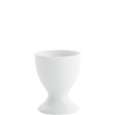 Ein eleganter, minimalistischer Eierbecher aus weißem Porzellan, der eine schlichte, runde Form mit einer breiten Grundlage und einer schmalen, nach oben verjüngten Öffnung hat. Der Becher ist ideal für die Präsentation von gekochten Eiern und verleiht festlichen Tischdeckungen einen stilvollen Akzent.