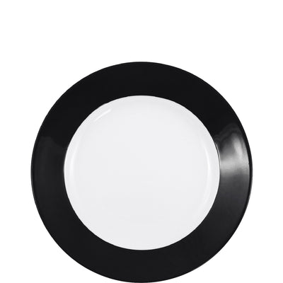 Ein runder Teller mit einem weißen Innenbereich und einem breiten, mattschwarzen Rand. Der Teller hat eine minimale, elegante Form und könnte für eine stilvolle Tischdekoration verwendet werden. Ideal für moderne Essenspräsentationen oder festliche Anlässe.